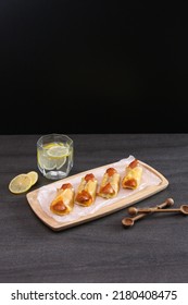 Crispy Dumpling Hot Dog Roll Dumpling Wrapper Cheese Mini Sausages Bake Snack Finger Food Party Food With Lemonade Wooden Tray On Table Bite Size