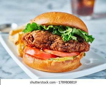 Crispy Fried Chicken Sandwich On Brioche Bun With French Fries