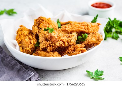 Crispy Fried Chicken In A White Bowl.