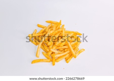 Crispy Fried French Fries Chips on a White Background