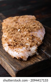Crispy garlicky chicken raw ingredient,  on wooden table - Shutterstock ID 2094417133