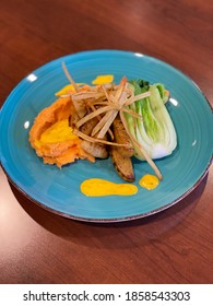 Crispy Gnocchi And Apples With Sweet Potato Puree And Baby Bok Choy And Yam Frites.