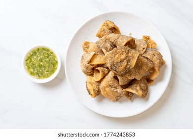 Crispy Gourami Fish with Spicy Seafood Sauce