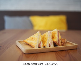 Crispy Ham Cheese Sandwich Served On Wooden Plate. On Selective Focus.