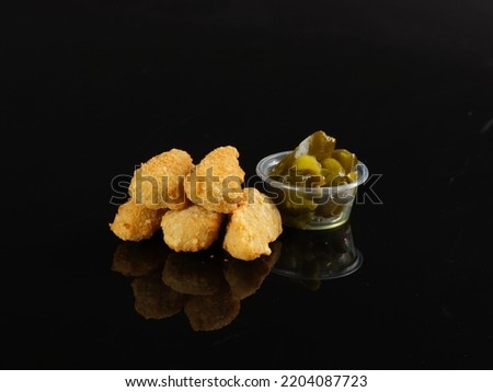 Crispy Jalapeno Popper bites with creamy cheese battered