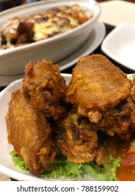 Crispy and juicy fried chicken wings stacks up