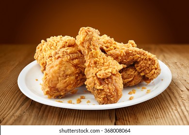 crispy kentucky fried chicken in a wooden table - Shutterstock ID 368008064