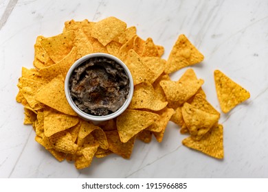 Crispy Nachos Tortilla Chips With Mexican Bean Dip, Flat Lay