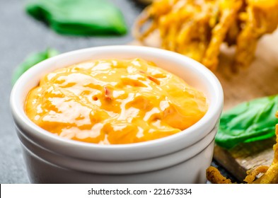 Crispy Onion Bhajis With Creame Cheese Dip With Jalapeno And Crunchi Toast On Spinach Leaves And Czech Beer