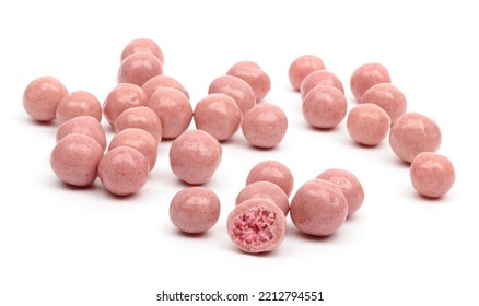 Crispy Pink Jelly Beans Scattered On A White Background