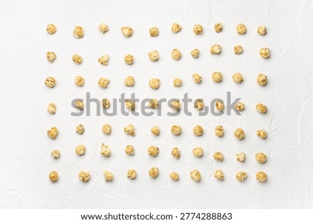 Crispy popcorn on light background