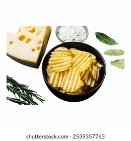 Crispy potato chips are displayed in a black bowl, alongside a generous wedge of cheese and a small bowl of creamy dip, complemented by fresh herbs Isolated on white back Isolated on white background - Powered by Shutterstock