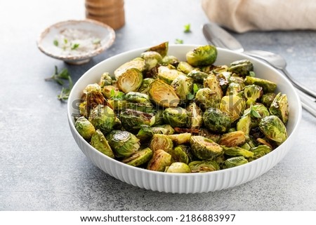 Crispy roasted or air fried brussel sprouts with honey dressing