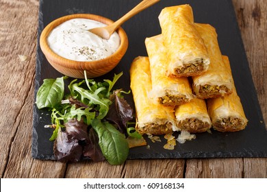 Crispy Rolls Borek Stuffed With Minced Meat And Eggs Close-up On The Table. Horizontal
