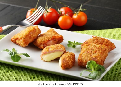 Crispy Rolls Of Ham With Cheese, Breaded With Breadcrumbs And Fried