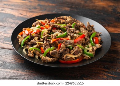 Crispy Salt and Pepper Beef with onion and bell peppers