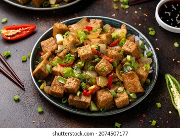 Crispy salt and pepper Tofu. Vegan, vegetarian healthy food - Shutterstock ID 2074507177
