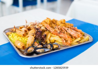 Crispy Seafood Mix Platter In Local Restaurant In Larnaca. Traditional Cypriot Food On Cyprus Island.