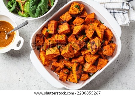 Similar – Image, Stock Photo Baked sweet potato with vegetable filling.