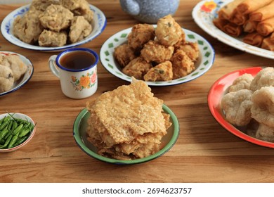 Crispy Thin SLice Fried Tempeh, Tempe Goreng Krispi, with other Various Gorengan for Breaking the Fast