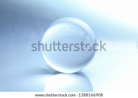 Cristal ball with reflection and shaddy background