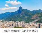 Cristo Redentor on the Corcovado mountain panorama view forests and cityscape of Alto da Boa Vista Rio de Janeiro Brazil.