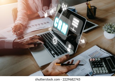 CRM Customer Relationship Management Business Internet Techology Concept, Business team analyzing income charts and graphs with customer Relationship Management icon on VR creen.
