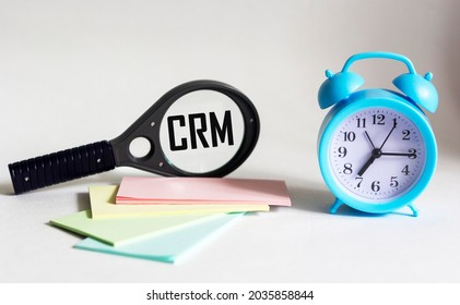 CRM, Customer Relationship Management, Loyalty Program, Repeat Purchase Frequency Concept, CRM Abreveatura Magnifier On White Background.