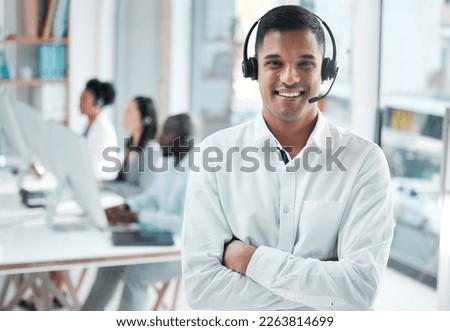 Crm, manager or portrait of man in call center smiles with pride, helping advice or networking online. Face, smile or happy Indian insurance agent in communication at customer services or sales job