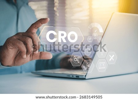 CRO concept, conversion rate optimization, digital marketing strategy, business professional using laptop, featuring KPI metrics CTR, ROAS, CPL, and A B testing icons for website performance growth