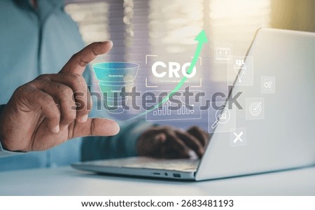 CRO concept, conversion rate optimization, digital marketing strategy, business professional using laptop, featuring KPI metrics CTR, ROAS, CPL, and A B testing icons for website performance growth