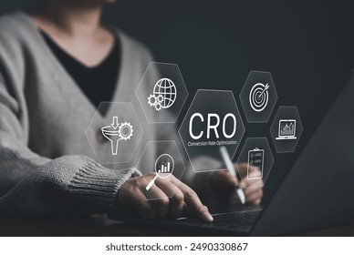 CRO, conversion rate optimization technology concept. A person works on a laptop with CRO related technology icons, symbolizing conversion rate optimization and digital marketing. business strategy,