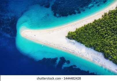 Croatia, Hvar island, Bol. Panoramic aerial view at the Zlatni Rat. Beach and sea from air. Famous place in Croatia. Summer seascape from drone. Travel - image