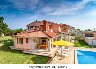 Croatia, Istria, Pula, holiday house with garden and pool, aerial view - Shutterstock ID 2174688345