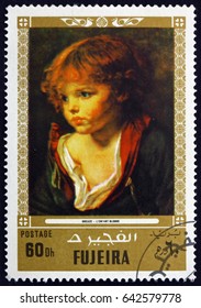 CROATIA ZAGREB, 7 MAY 2017: A Stamp Printed In The Fujeira Shows A Blond Haired Boy With An Open Shirt, Painting By Jean Baptiste Greuze, French Painter, Circa 1972