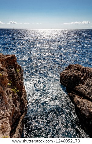 Cape with cliffs and sea