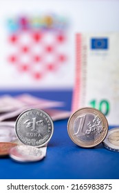 Croatian currency, kuna, together with Euro coins and 10 Euro banknote. Croatia adopted a European currency theme with the Croatian flag motif in the background.