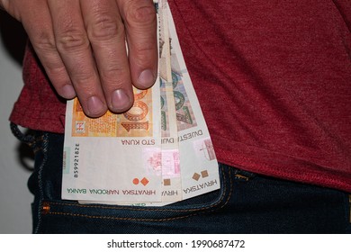 Croatian kuna banknotes in jeans pocket