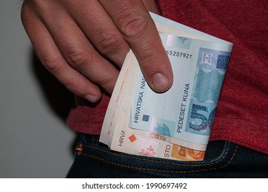 Croatian kuna bills in jeans pocket. Croatian currency