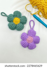 Crochet flower pattern or key chain in selwctive focus