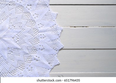 Crochet Lace Doily On A White Table Top