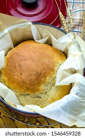 A Crock Pot Containing Newly Baked Home Made Bread 