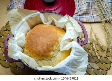 A Crock Pot Containing Newly Baked Home Made Bread 