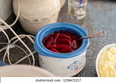 A Crock Pot Containing Sliced Harvard Beets