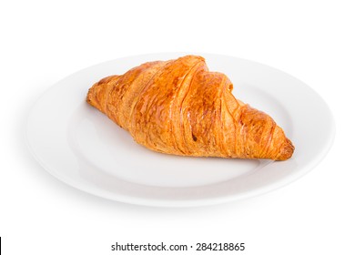 Croissant On A White Plate Isolated On White