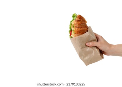 Croissant In A Paper Packaging Bag Mockup, Take Away Food. Take Away Fresh French Croissant With Cheese And Lettuce In Paper Bag. Copy Space., Place For Text