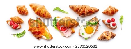 Croissant sandwich variety panorama. Different stuffed croissants, overhead flat lay shot on a white background. Rolls filled with ham, salmon, egg, etc Foto d'archivio © 