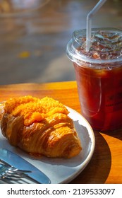 Croissant Served With Salted Egg Sauce