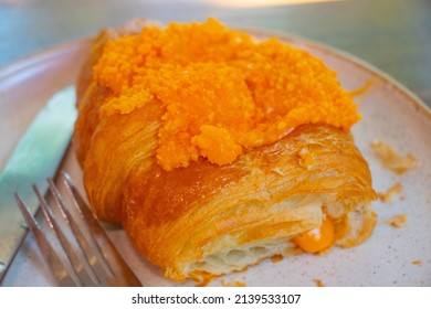 Croissant Served With Salted Egg Sauce