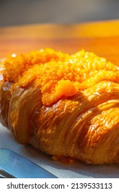 Croissant Served With Salted Egg Sauce